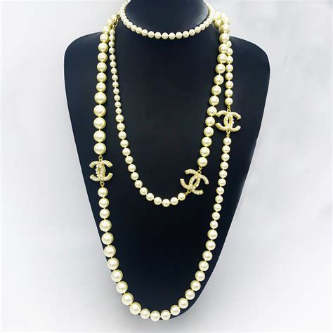 chanel mini necklace|Chanel long necklace with pearls.